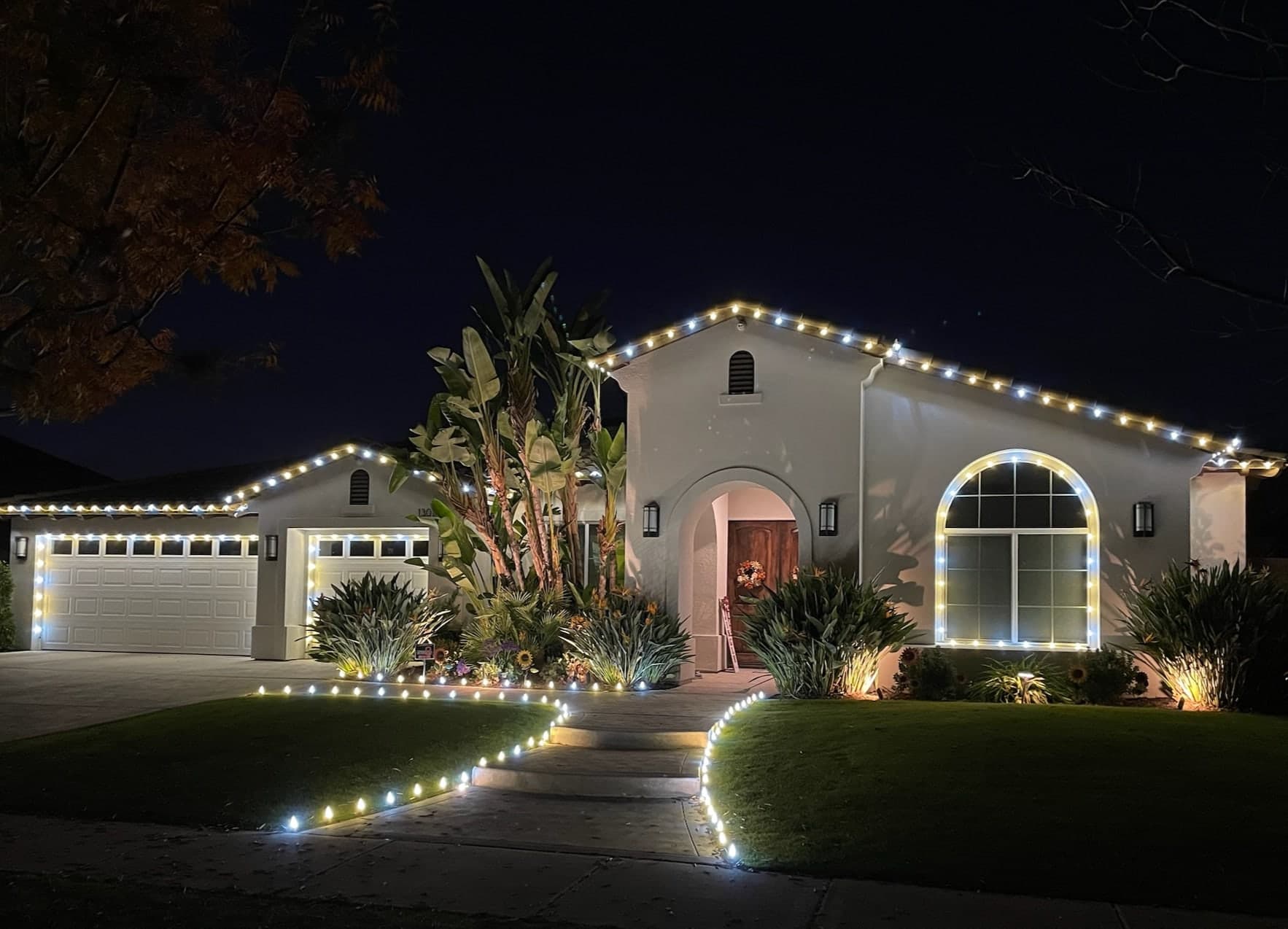 Mixed Soft & Bright White. Christmas light installation by Bright Idea Christmas Lights.